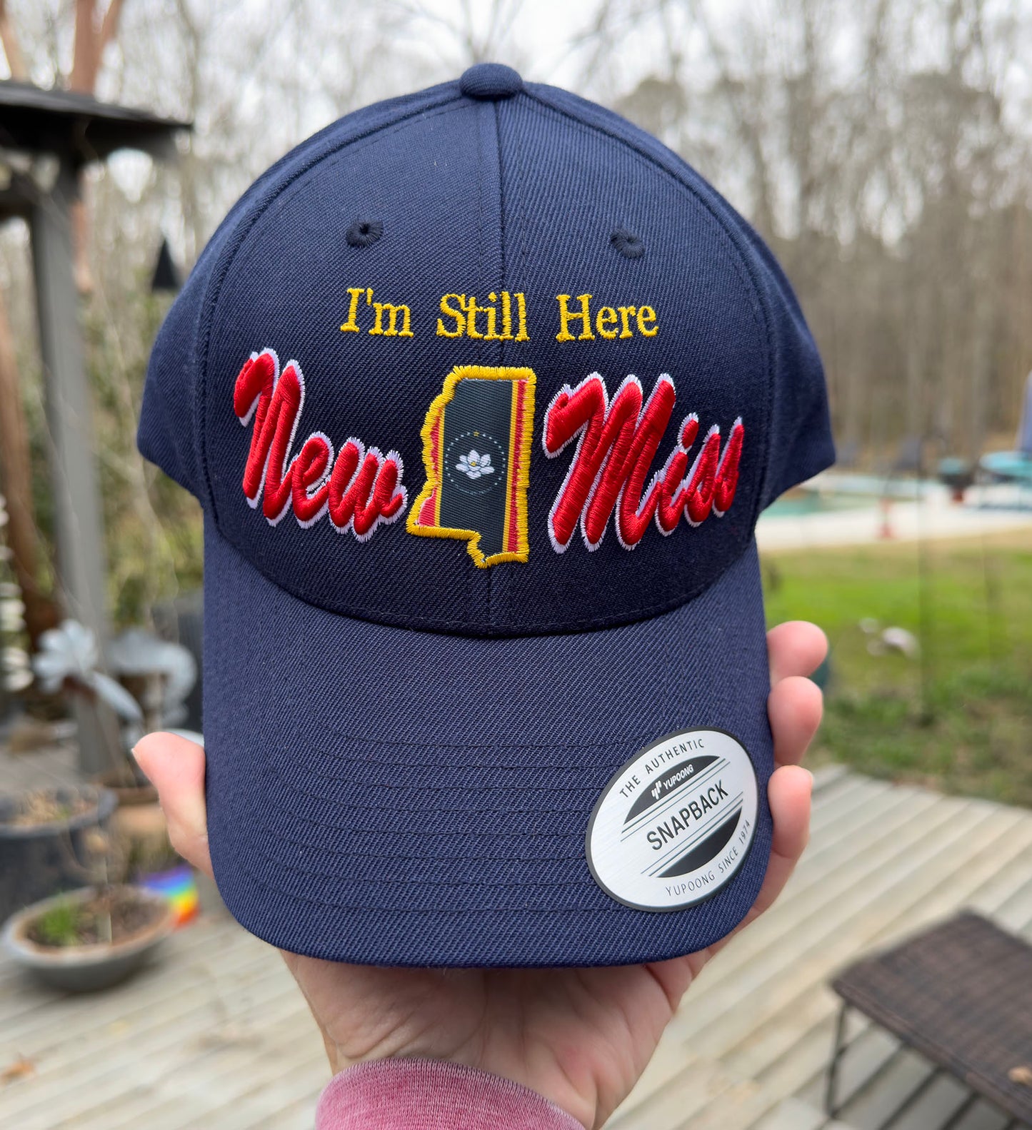 SOLD OUT--- * " I'm Still Here" -Limited Edition Navy Curved brim STRUCTURED Hat featuring New Miss logo and Flag cutout